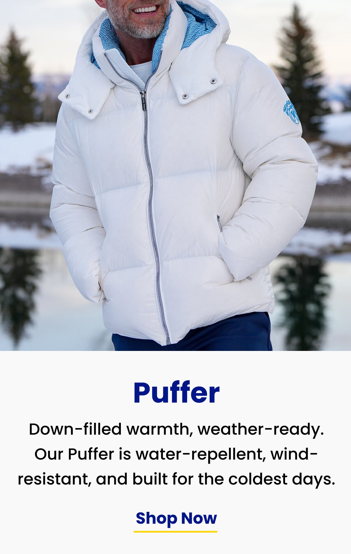 down-filled warmth, weather-ready. White Peak Puffer, hood up, by a snow-dusted pond